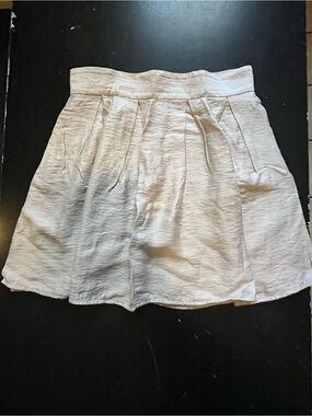 BCBGeneration Light Beige Mini Skirt with Button and Zipper Detail